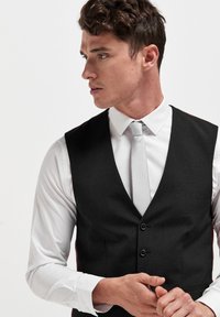 Next Vest - black