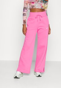 Nike Sportswear SPORTSWEAR PHOENIX FLEECE - Calças de fato de treino - pinksicle