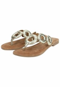 Sandales plates marron avec des lanières en chaîne dorée métallisée et des entre-doigts de style thong, conçues pour un usage quotidien.