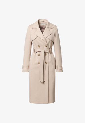 Beżowy dwurzędowy trencz z szerokimi klapami, paskiem w talii, zapinanymi na guziki mankietami oraz sięgającym do kolan brzegiem.