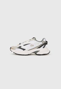 White and gray sneakers with mesh upper, black accents, and textured sole. Features laces, branding, and contrasting design elements.