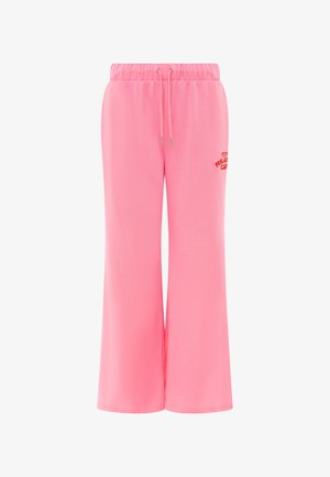 Rosa weite Sweatpants mit elastischem Bund und Kordelzug, mit kleinem roten Schriftzug „Feel Good Club“ am oberen linken Oberschenkel.