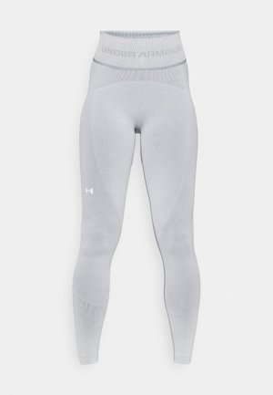 Světle šedé legíny s vysokým pasem vyrobené z elastického materiálu, s ribbenou texturou, logem Under Armour a jemnými kontrastními švy.