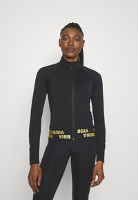 Nebbia NEBBIA WOMEN'S ZIP-UP JACKET INTENSE WARM-UP - Treningsjakke - black/gold