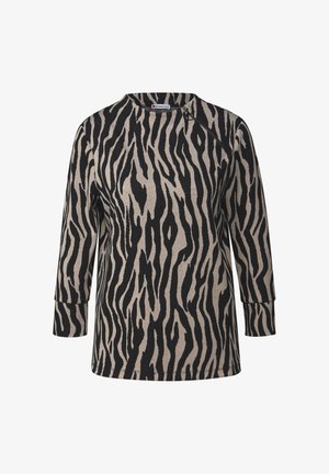 Beige en zwarte top met zebra-patroon en lange mouwen, voorzien van een ronde halslijn en een ritssluiting aan de zijkant. Zacht stof met een relaxte pasvorm.