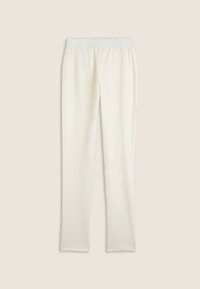 Leggings blancs légers avec une texture douce et une taille élastique. Design lisse, coupe ajustée, sans motifs ni embellissements.