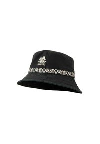 Chapeau seau noir en tissu texturé avec un bandeau à motif floral et un logo "Rip Curl" blanc à l'avant.