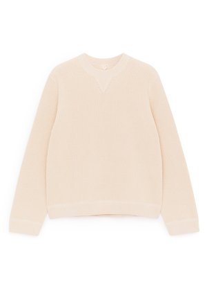 Linen knit pullover in light beige. Features a round neckline, long sleeves, ribbed texture, and a straight hem with ribbed detailing.