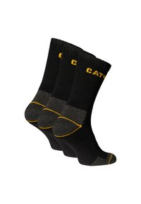 Trois paires de chaussettes noires avec un talon renforcé, des rayures grises et un logo jaune. Texture tricotée compacte avec des bords à côtes en haut.