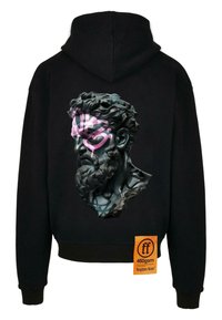 Black hoodie featuring a textured graphic of a classical bust with pink accents, and a branded tag on the lower left side.