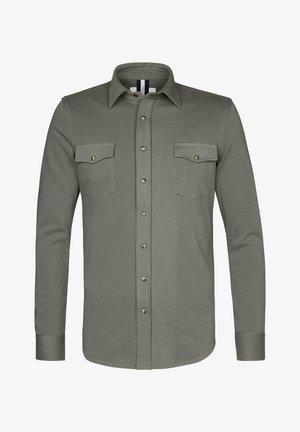 Khakikleurig overhemd met lange mouwen, twee borstzakken, koperen knopen en een puntige kraag. Gemaakt van gestructureerde stof met een gladde afwerking.