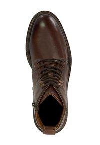 Brown leather ankle boot with rounded toe, lace-up front, and contrasting stitched accents around the sole. Interior is dark with no lining detail.