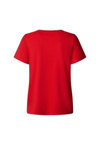 T-shirt rouge en coton à manches courtes avec un col rond et une texture douce, à coupe droite et sans logos ni motifs visibles.