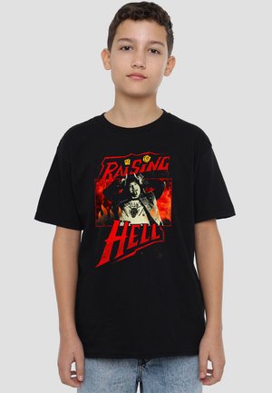 Black cotton t-shirt featuring a bold graphic print with red text reading "Raising Hell" and a central image against a fiery background.