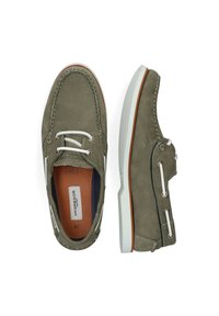 Harmaat mokkasaappaat valkoisilla nauhoilla, pehmustettu kaulus ja valkoinen kumipohja. Sisävuori on kontrastivärinen. Koko 42.