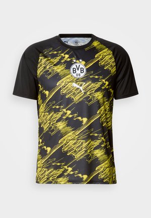 Juoda ir geltona Borussia Dortmund futbolo marškinėliai su abstrakčiais geltonais dryžių raštais, BVB 09 logotipu ir baltu Puma logotipu ant krūtinės.