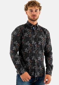 Camicia nera con bottoni, decorata con un motivo floreale in tonalità grigie e ruggine. Presenta un colletto classico e maniche lunghe, realizzata in tessuto leggero.