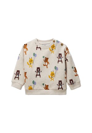 Sweatshirt beige clair avec des motifs d'animaux ludiques en orange, marron et jaune. Encolure arrondie avec deux boutons-pression sur l'épaule.