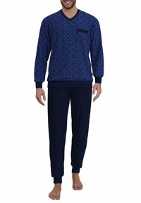 Marineblaue Schlafanzug-Set mit einem gemusterten langärmeligen Oberteil mit V-Ausschnitt und Tasche, kombiniert mit einfarbigen, schmal zulaufenden Hosen. Weicher Stoff.