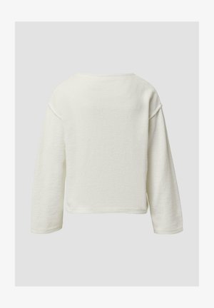 Pullover met ronde hals van gestructureerde, gebroken witte stof. Voorzien van lange mouwen en een losse pasvorm met zichtbare stiksels langs de randen.