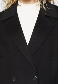 Maje Manteau classique - black