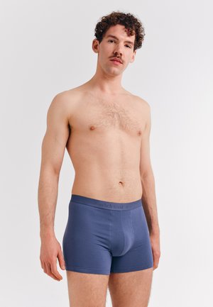 Männer Boxershorts in Blau aus Baumwolle. Verfügt über einen weichen Bund mit dezentem Branding. Glatte Textur und körpernaher Schnitt.