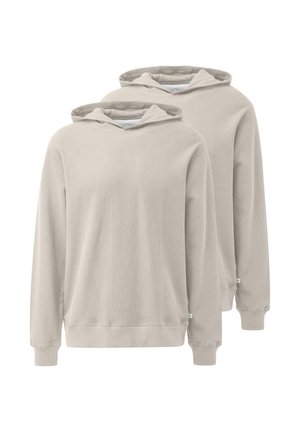 To enkle lyse beige hættetrøjer med lange ærmer og ribkant ved manchetterne, vist side om side på en hvid baggrund.
