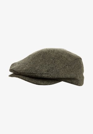 Casquette plate marron à motif chevrons avec une petite visière rigide, en tissu de laine texturé.