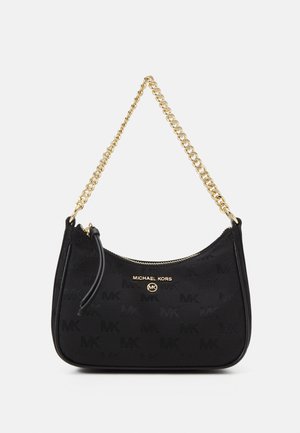 Petit sac à main noir Michael Kors avec un motif de logo subtil, lettrage du logo en or et une courte anse chaîne en or.