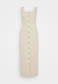 Bežinis lino midi suknelė su plačiomis petnešomis, mygtukų uždarymu priekyje ir dviem šoninėmis kišenėmis. Turi prigludusią viršutinę dalį ir plačią sijoną. Lygus audinys.