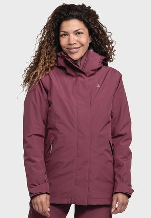 Maroon waterproof jacket featuring a high collar, zippered pockets, and subtle textured design. Includes logo on the chest and sleeves.