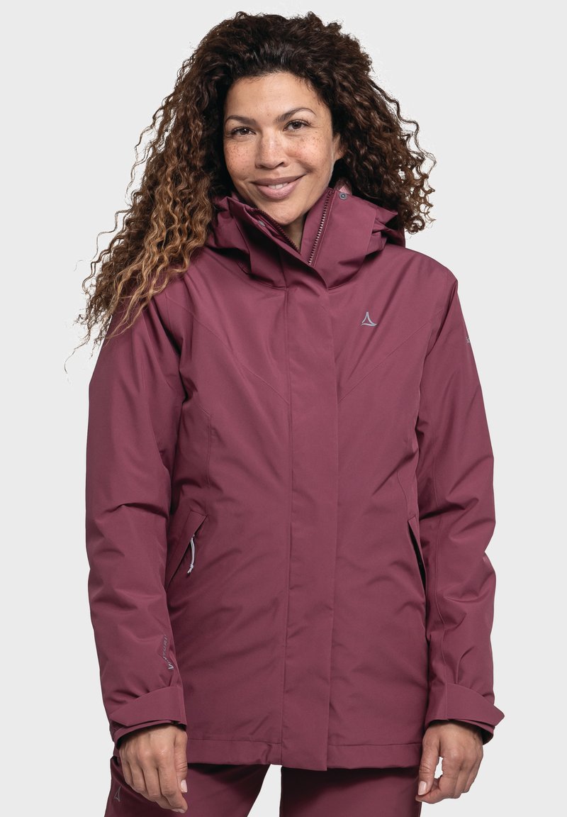 Maroon waterproof jacket featuring a high collar, zippered pockets, and subtle textured design. Includes logo on the chest and sleeves.