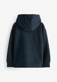 Felpa con cappuccio di un blu navy scuro, dal tessuto morbido, design oversize e polsini e orlo a costine. Presenta una classica tasca a marsupio.