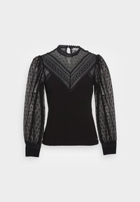 Schwarze Bluse mit durchsichtigen, gepunkteten langen Ärmeln, gewelltem Ausschnitt und tailliertem Oberteil. Verfügt über einen strukturierten Stoff und elastische Bündchen.