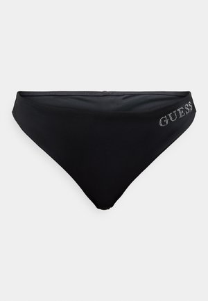 Juodos spalvos bikinio apačia su lygiu paviršiumi, žemu juosmeniu ir diskretišku petnešių "GUESS" logotipu, puoštas krištoliukais šone.