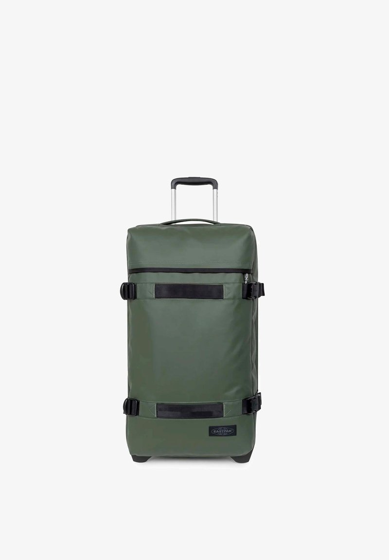 Valise rectangulaire verte à roulettes avec poignée télescopique, sangles noires et poche zippée à l'avant.
