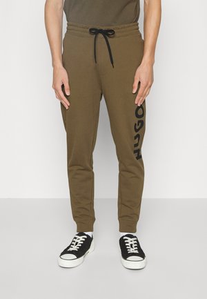 DUTSCHI - Tracksuit bottoms - dark green