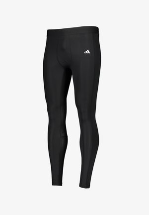Black athletic leggings made of stretchy material, featuring a fitted design and an elastic waistband. Small white logo on one side.