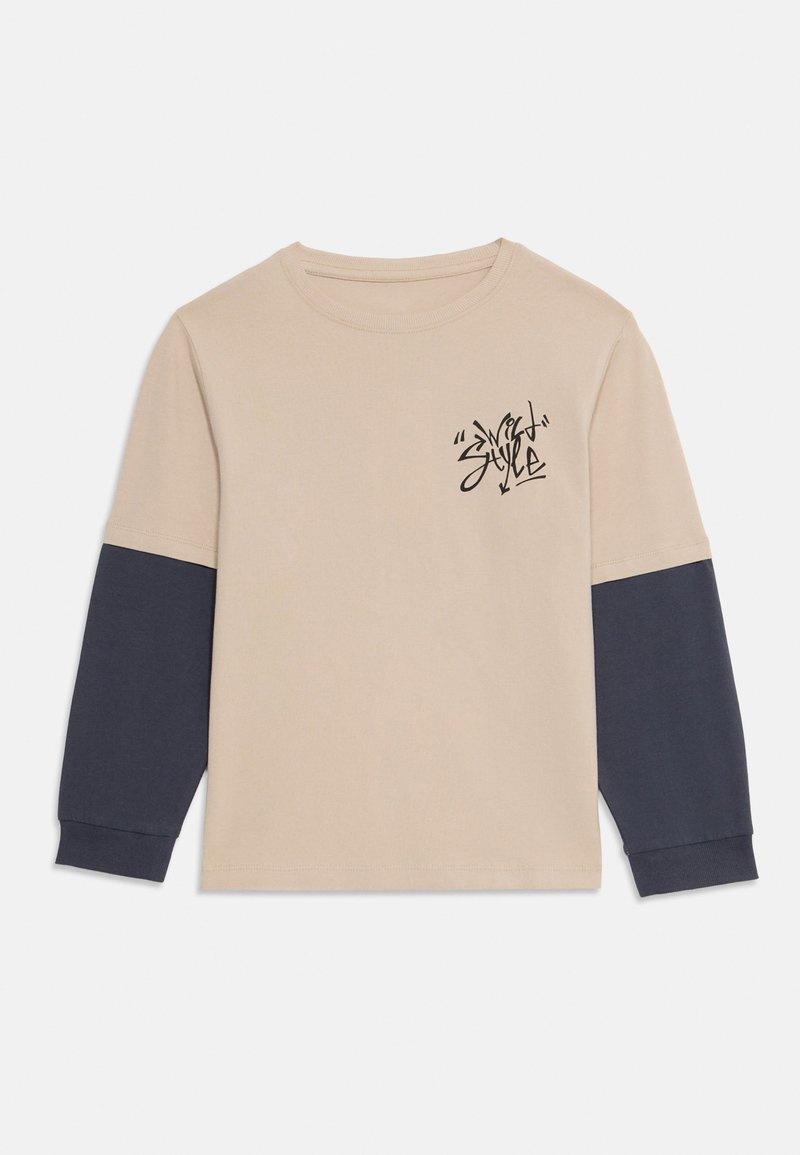 name it Longsleeve beige