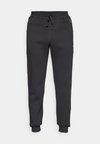 CORE HERITAGE SLIM FIT - Trainingsbroek - black