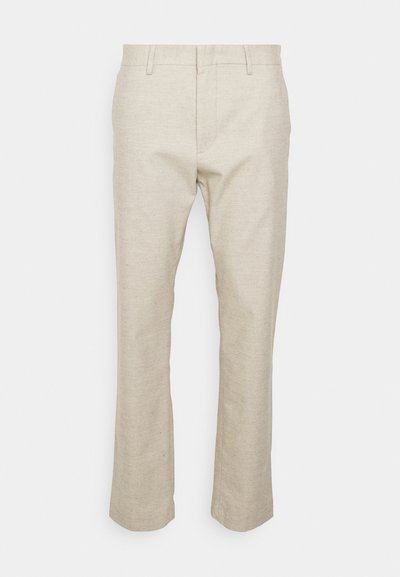 Beige Leinenhosen mit geradem Bein, Fronttaschen und glatter Textur. Minimalistisches Design; keine sichtbaren Muster oder Beschläge.