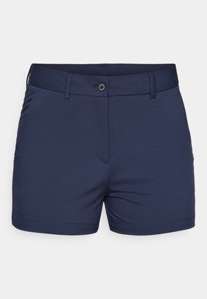 Tumedad sinised lühikesed püksid, mis on valmistatud siledast kangast. Neil on esine nupu sulgus, kaks külgtaskut ja hoolikalt viimistletud servadega kohandatud lõige.