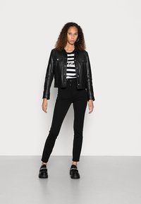 Guess GRETA SKINNY PANTS - Calças - jet black