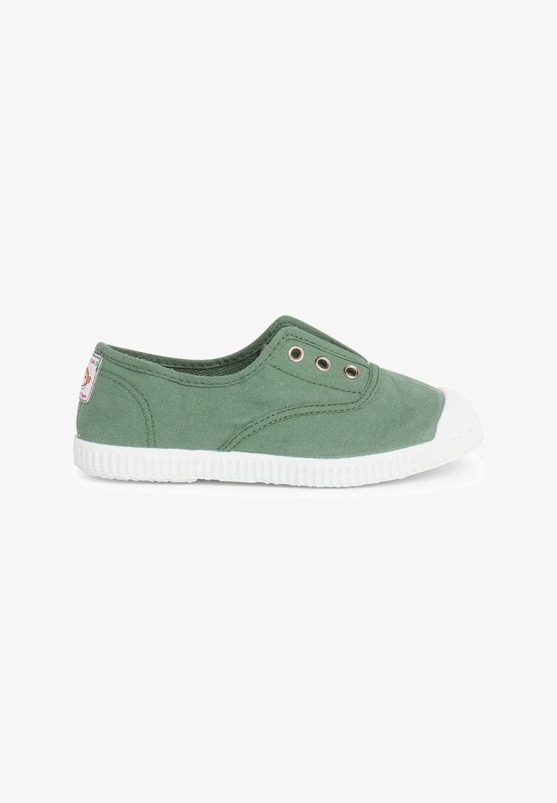 Roheline kangast libistatav king, millel on valge kummist tald ja varvaskate. Omab kaht metallist silmust külgedel, et tagada hingavus.