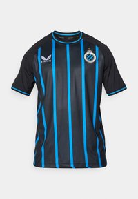 Camisola de futebol preta com riscas verticais azuis, mangas curtas, logo da Castore no lado esquerdo do peito e brasão do Club Brugge no lado direito do peito.