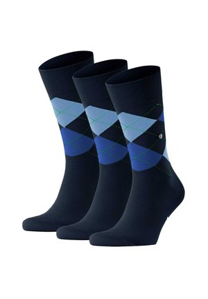 Navy socks featuring a geometric argyle pattern in varying shades of blue and green. Made of soft, stretchy material for comfort.
