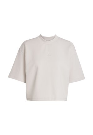 Felpa corta color grigio chiaro con maniche corte, texture a coste e scollo rotondo. Presenta un logo tonale discreto sul petto.