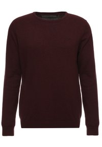 Bordeauxfarbener Wollpullover mit Rundhalsausschnitt, langen Ärmeln und gerippten Bündchen. Verfügt über ein kleines Logo auf der Brust. Glatte Textur.