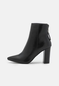 NETHRA - Stiefelette - black