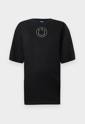 Μαύρο βαμβακερό t-shirt με κοντά μανίκια, που διαθέτει σχέδιο με χαμογελαστό πρόσωπο διακοσμημένο με ασημένιες στρας στο στήθος.